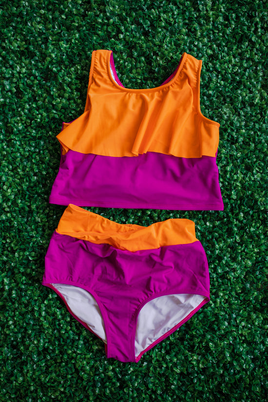 SwimHer Extended Sizing Tankini Swim Top in Magenta/Orange and Crossover High Rise Swim Bottoms in Magenta/Orange